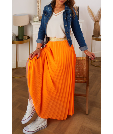 long orange pleated skirt